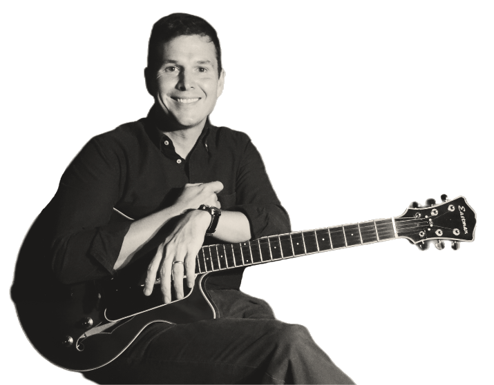Max Robertson with guitar